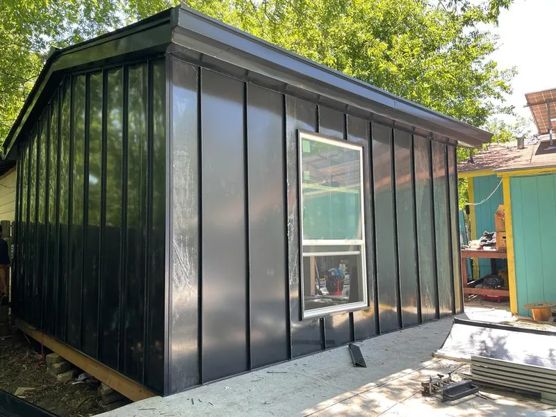 Black standing seam metal wall panels for Metal Roof Installation in Bourbonnais